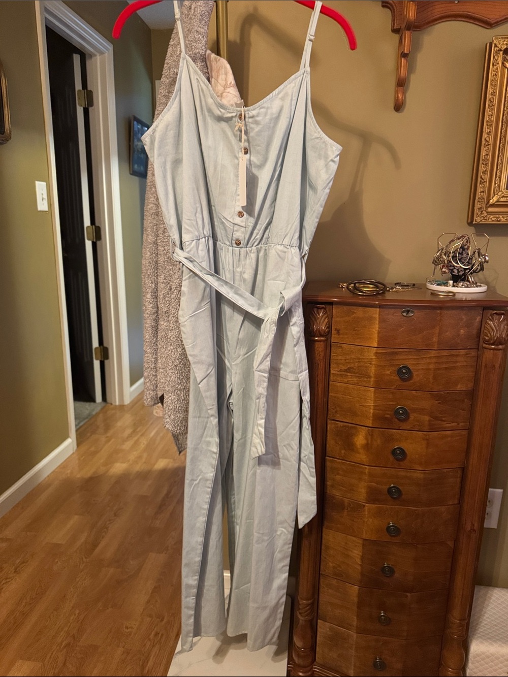 Sleeveless Light Blue Button-Front Jumpsuit with Tie Waist